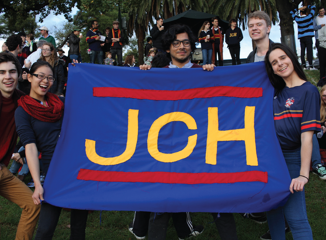 Janet-Clarke-Hall-Students-with-flag